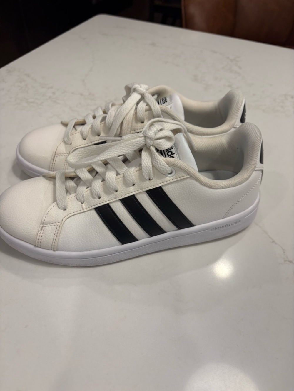Adidas White Sneakers with Black Three Stripes